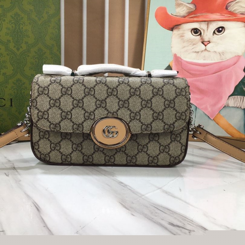 G*u*i top handle bags